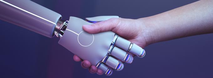 robot and human shaking hands