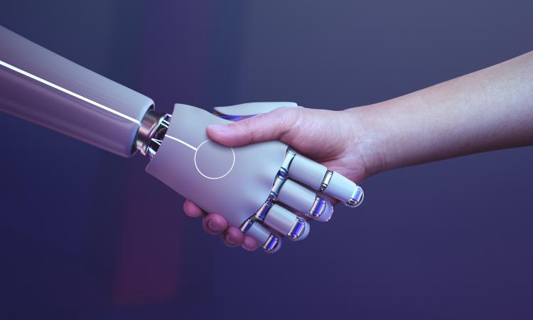 robot and human shaking hands